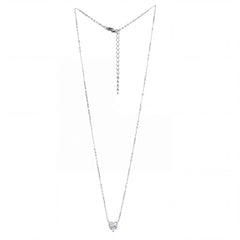 A delicate silver chain necklace with a small heart-shaped clear gemstone pendant, displayed against a plain white background.