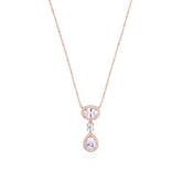 Rose gold plated 925 sterling silver necklace featuring a double drop pendant with a micro-pave halo surrounding brilliant oval and pear-cut clear gemstones on a delicate link chain