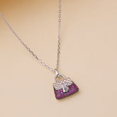 Necklace with a pink handbag-shaped pendant on a beige 925 silver pendant for women background