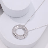 Pure 925 Silver necklace with a circular clock pendant with roman numerals on it