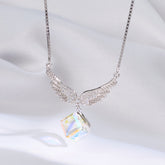925 Silver necklace with angel wing design and crystal pendant on a white background