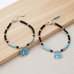 Silver Peacock Charm Black Beaded Baby Bracelet
