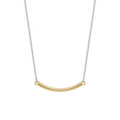 Gold curved pendant necklace on a white background
