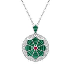 Jewelry necklace with a green pendant and red gemstone on a white background for women