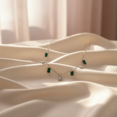 Silver Emerald and Cubic Zirconia Station Dangle Necklace