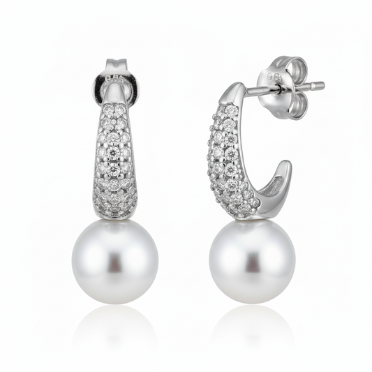 Silver Crescent shaped Pearl drop earrings in Bali pattern