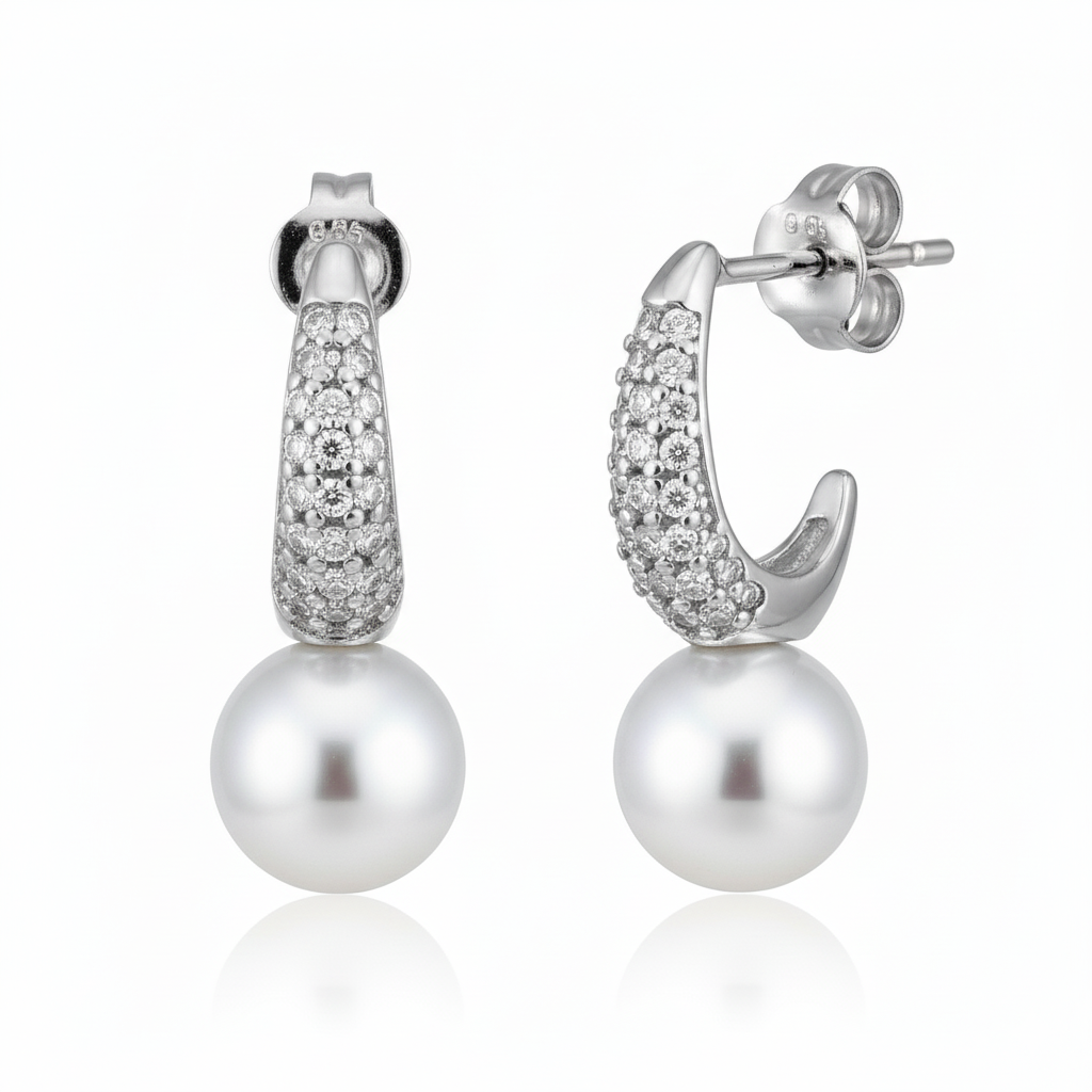 Silver Crescent shaped Pearl drop earrings in Bali pattern