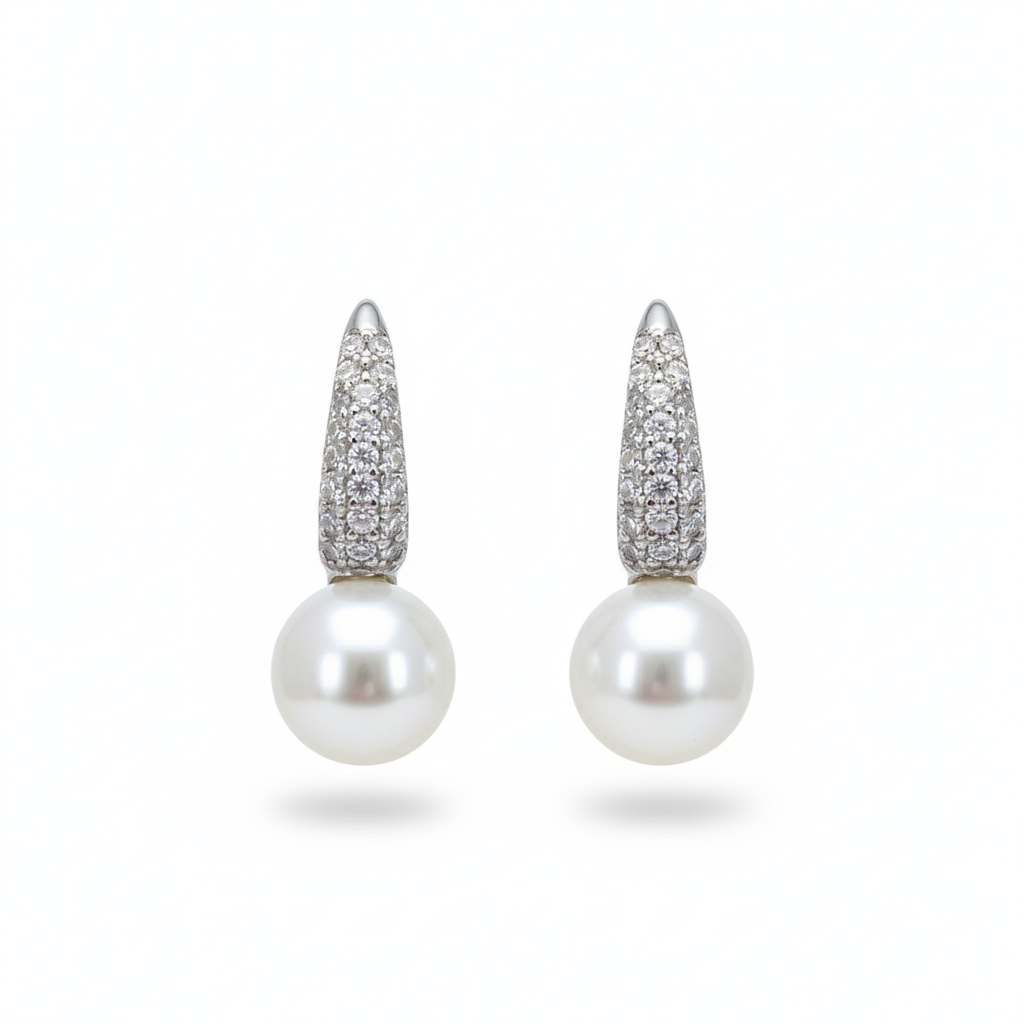 Silver Crescent shaped Pearl drop earrings in Bali pattern