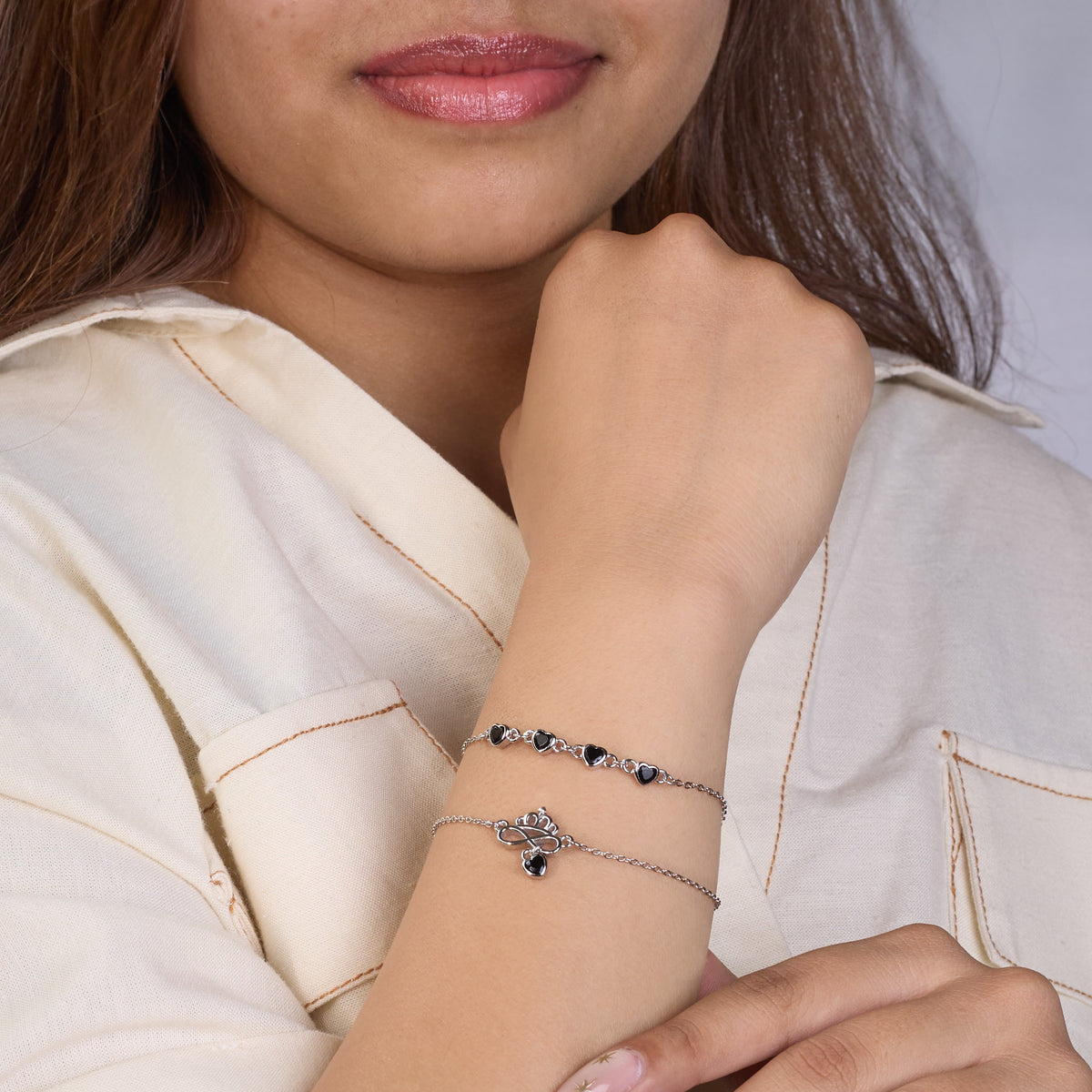 Silver Double Layered Black Heart Charm Bracelet with Crown Infinity