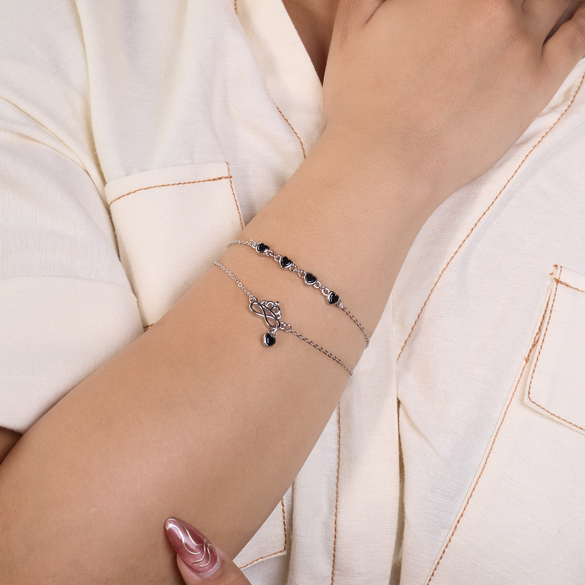 Silver Double Layered Black Heart Charm Bracelet with Crown Infinity