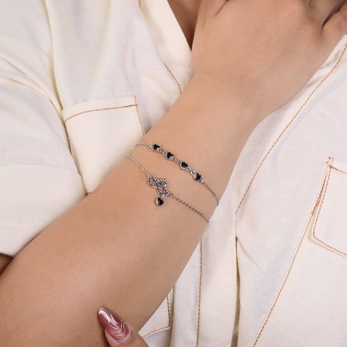 Silver Double Layered Black Heart Charm Bracelet with Crown Infinity
