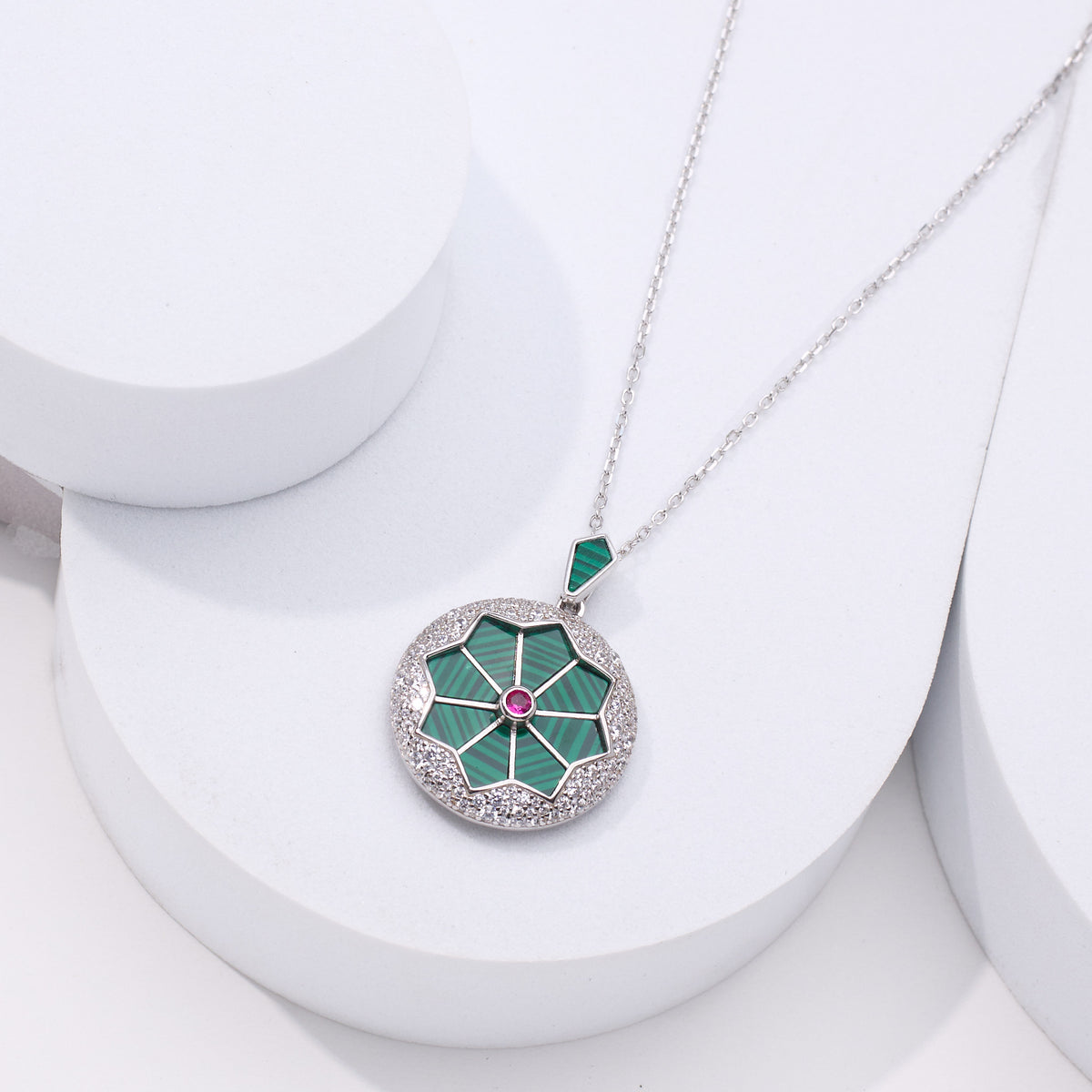 Silver necklace with a green pendant for women
