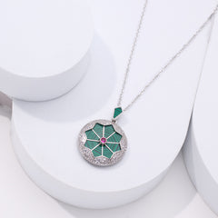 Silver necklace with a green pendant for women