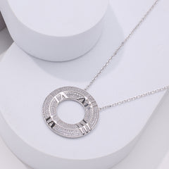 Pure 925 Silver necklace with a circular clock pendant with roman numerals on it 