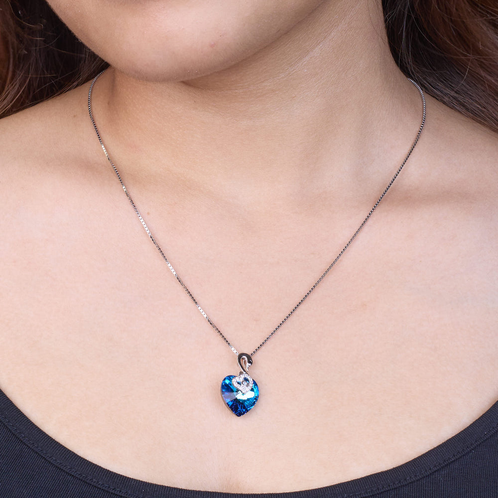 Necklace with a blue heart-shaped pendant