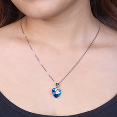 Necklace with a blue heart-shaped pendant