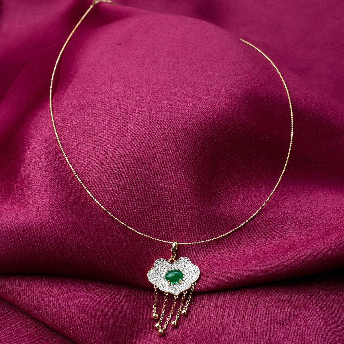 Pure silver Gold necklace with a cloud shaped pendant featuring an emerald stone with omega chain 