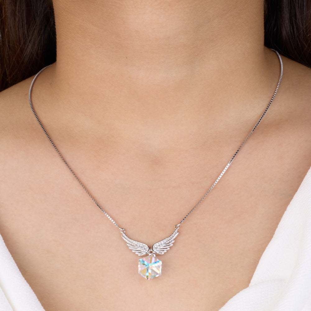 925 silver Necklace with angel wing pendant on a person wearing a white top
