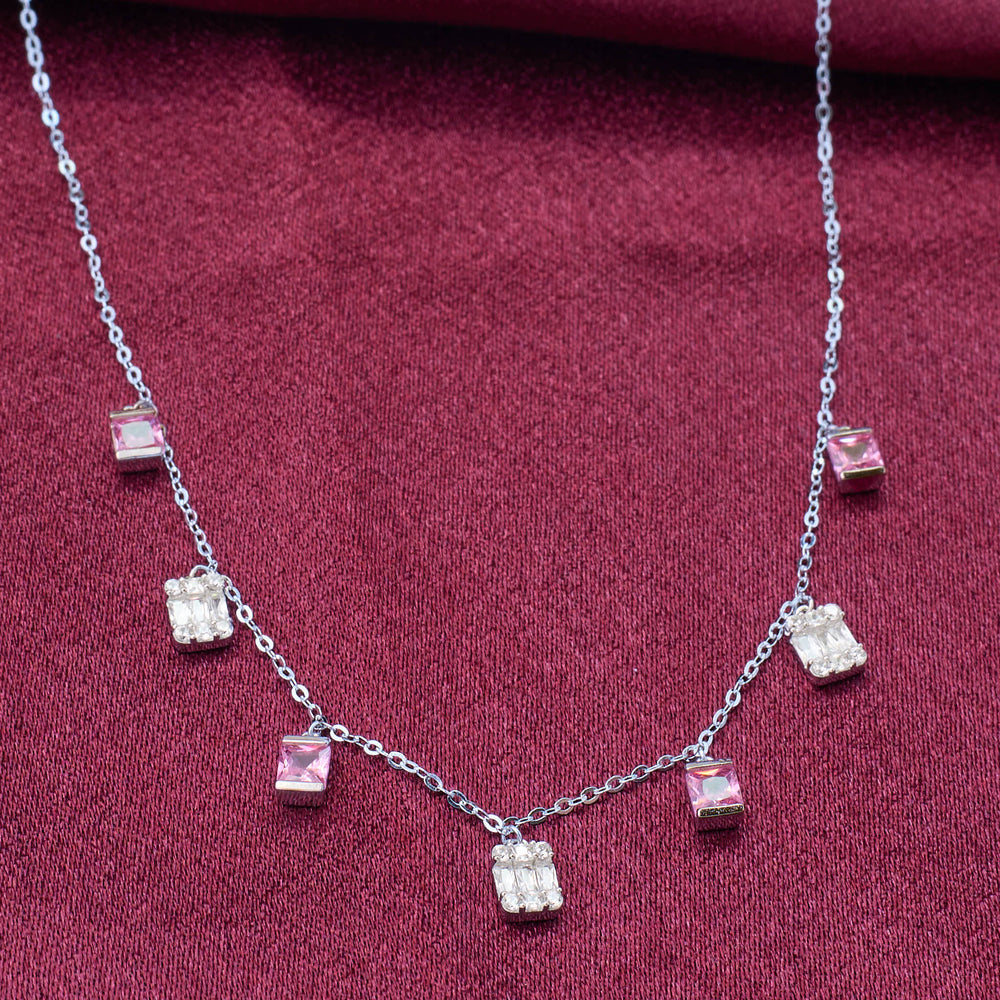 925 silver Necklace with square-shaped gemstones on a red fabric.