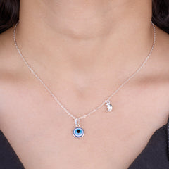 Necklace with evil eye and moon pendant on a person's neck 925 Silver pendant for women