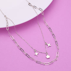 Silver chain necklace with star pendants on a pink background 925 Silver pendant for women