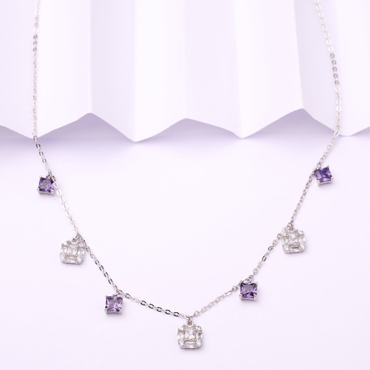 925 silver Necklace with purple gemstones on a white background