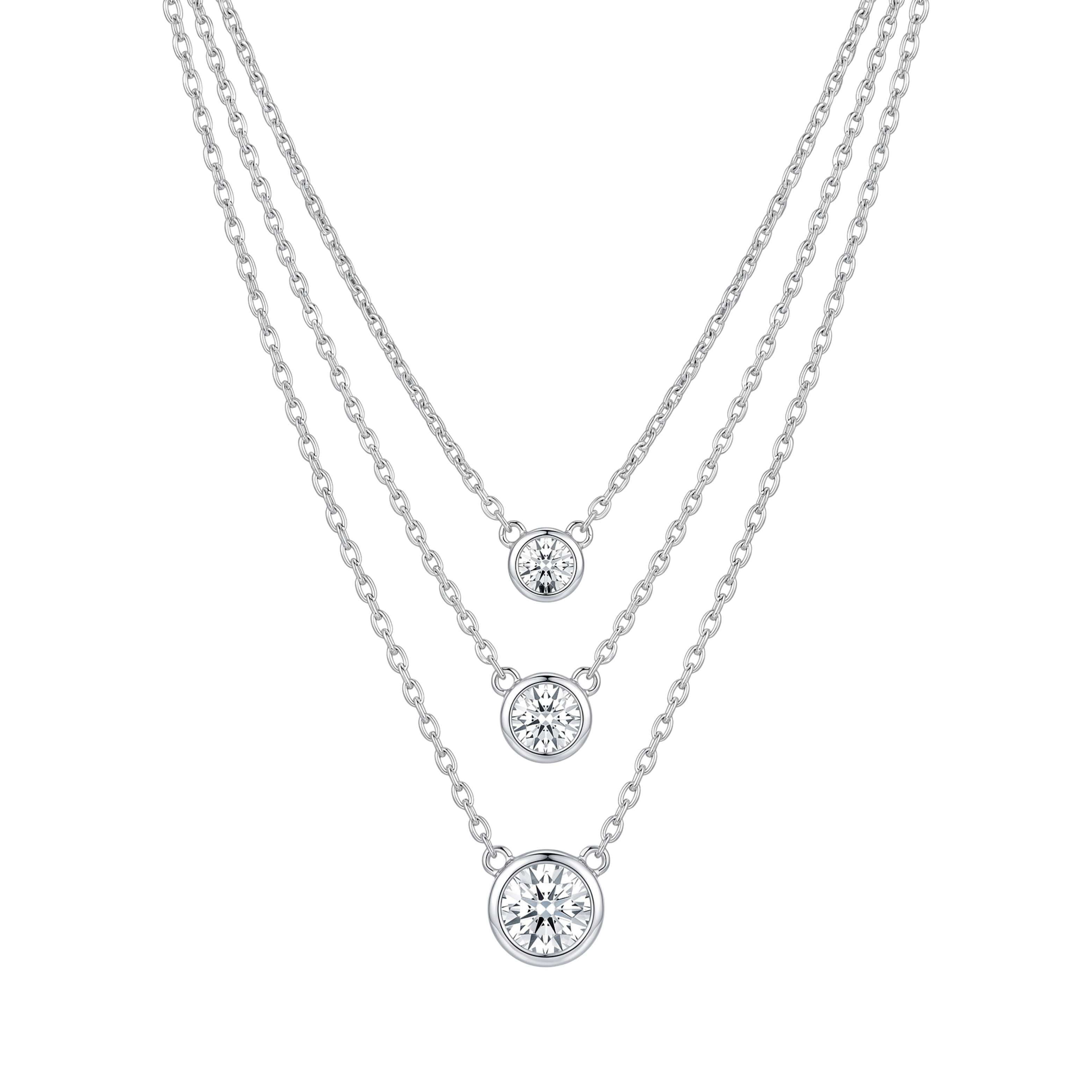 Three silver necklaces with round diamond pendants for women