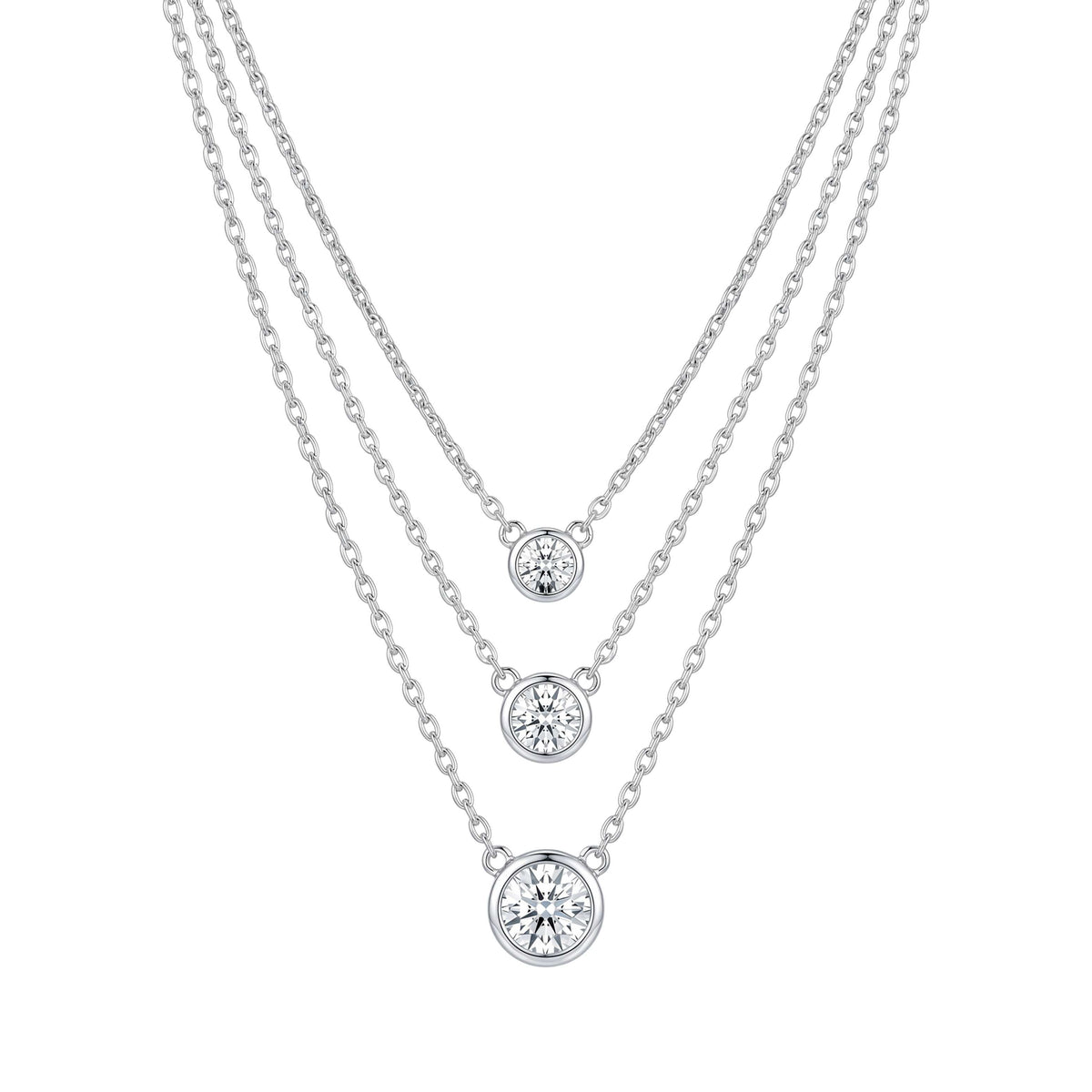 Three silver necklaces with round diamond pendants for women