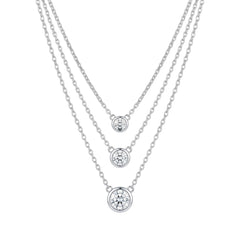Three silver necklaces with round diamond pendants for women